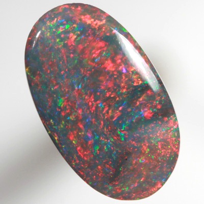 SOLID BLACK OPAL Gemmy red, very bright and rich SEE VIDEO